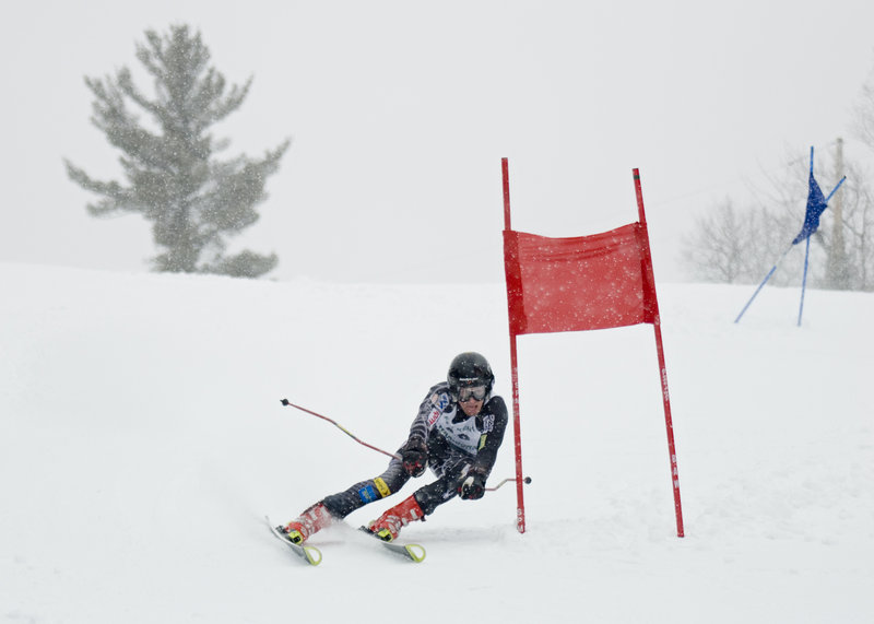 Alex Rose cruises past a gate at the Class C meet at Lonesome Pine Trails in Fort Kent. Rose swept both Alpine titles in the February meet, repeating his sweep of the 2009 titles.