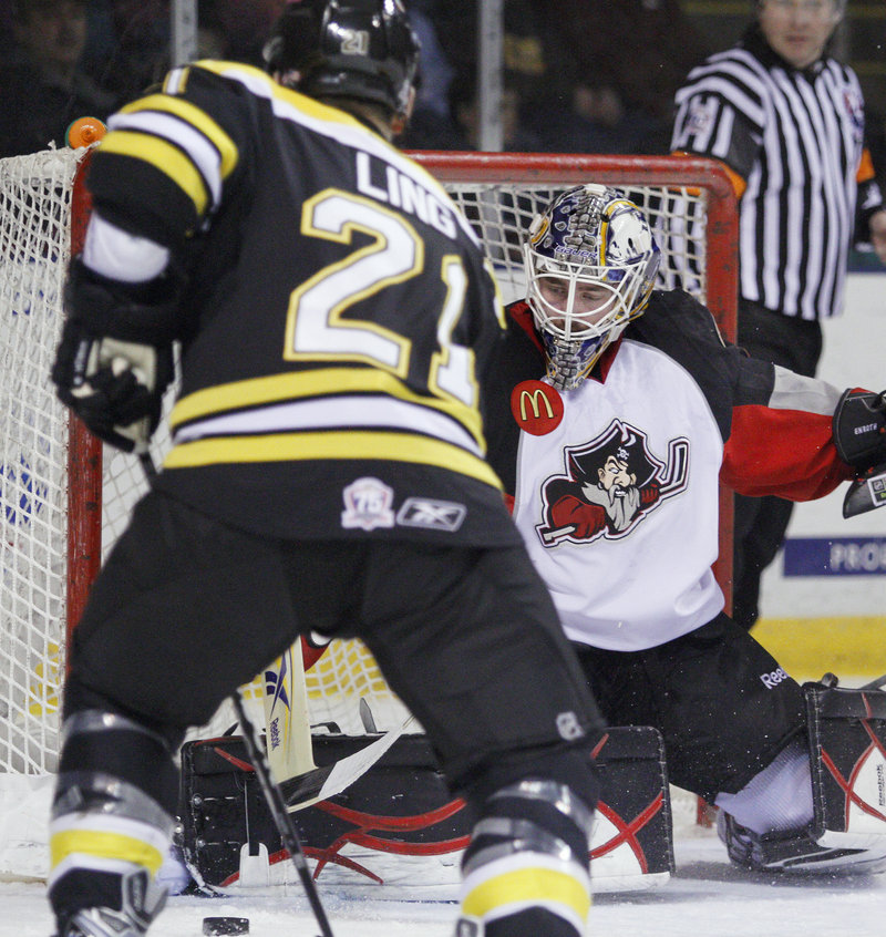 Pirates goalie Jhonas Enroth, making a save on Providence s David Ling, helped Portland survive a slow start by making 15 of his 24 saves in the first period and killed off four penalties. The period ended in a 1-1 tie.