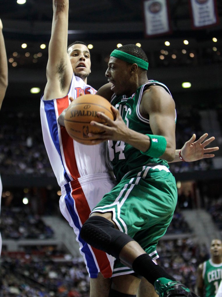 Paul Pierce, who scored 33 points Wednesday night for the Boston Celtics, drives against Austin Daye of the Detroit Pistons.