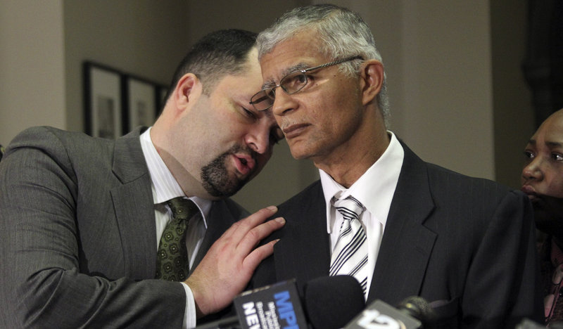 Attorney Chokwe Lumumba, right, and NAACP National President Benjamin Jealous confer during a news conference about the pending release of sisters Gladys and Jamie Scott at the Capitol in Jackson, Miss., on Thursday.