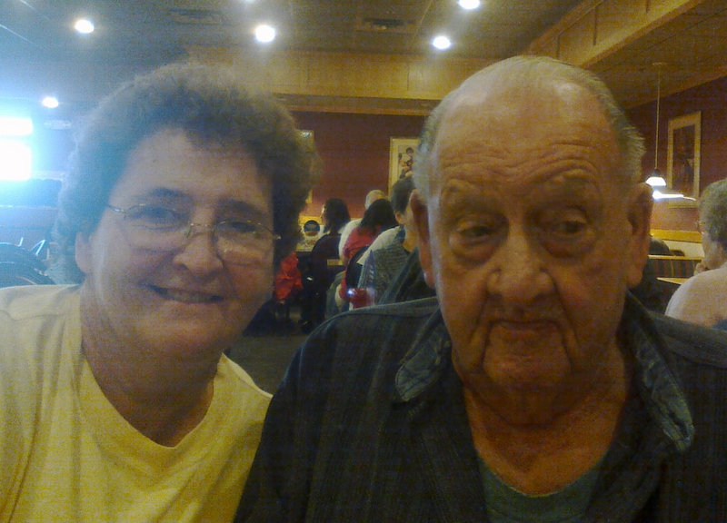 Linwood Weeman Sr. poses with his daughter Martha at their Thanksgiving Day dinner this year.