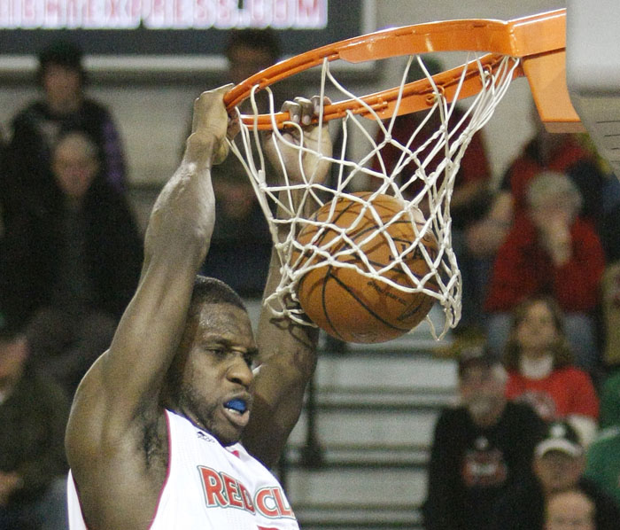 Champ Oguchi stuffs a shot during fourth-quarter action at Red Claws vs. Springfield Armor at the Portland Expo Sunday.