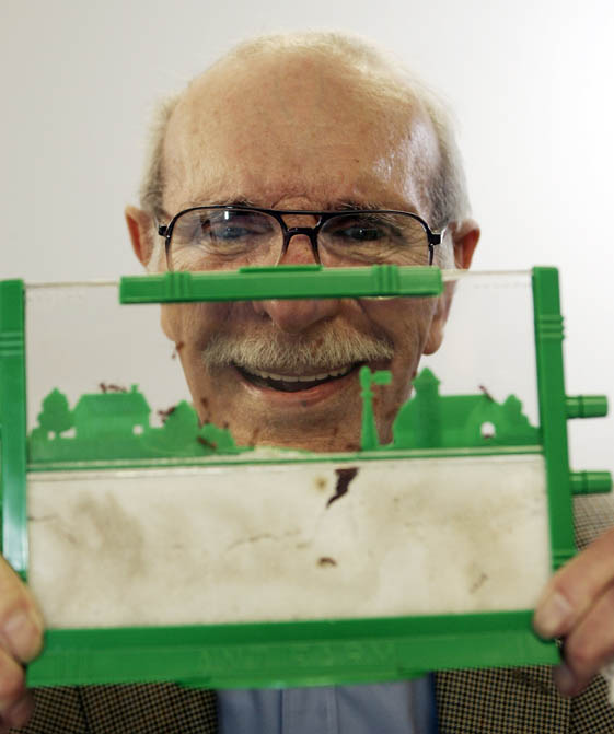 In this 2006 photo, Milton Levine, co-inventor of the classic Ant Farm educational toy, poses with his invention.