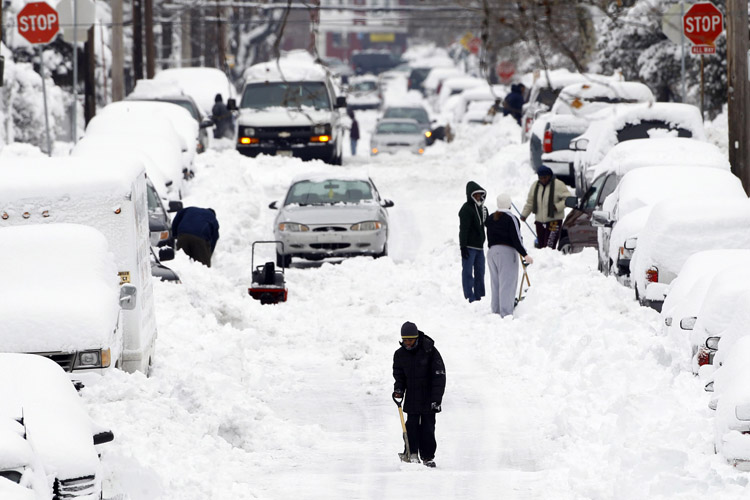 Philadelphians try to dig out in the aftermath of a winter storm that dropped 17 inches on the city.