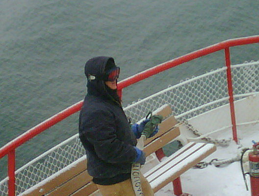Andy Gildart mans a fire hose as the Casco Bay Lines ferry Maquoit II stands by to help fight a fire on the fishing boat Debra Lee. Gene Willard photo. Sent from my BlackBerryÂ® smartphone with Nextel Direct Connect