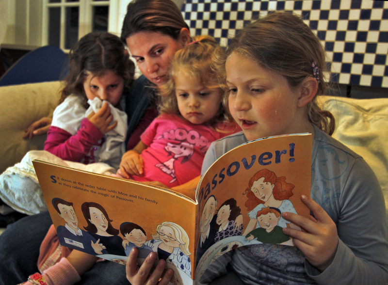 Sharon Litwak and her children Andrea, 7, left, Jessica, 5, right, and Ilana, 2, read Jewish books at home in Tarzana, Calif. At a time when the Jewish identity is at risk of being diluted, Litwak said it helps Ã¢ to bring new ideas into the house, like new ideas of what you can do during Shabbat.Ã¢ 01000000 12000000 ACE krtcampus campus krtentertainment entertainment krtfeatures features krtnational national krtreligion religion REL krtedonly mct 01010000 krtculture culture krtliterature literature 12011000 krtjudaism judaism jewish jew krtdiversity diversity woman women youth 2011 krt2011