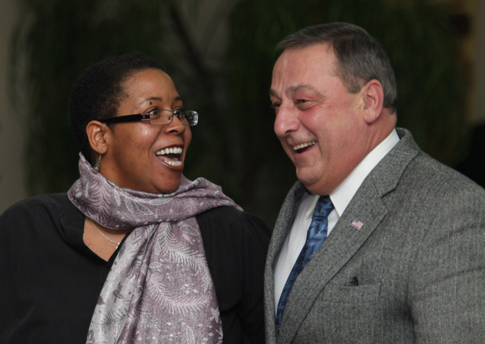 Gov. Paul LePage dances briefly with Rev. Effie McClain today at the Waterville Rotary Club's annual Dr. Martin Luther King Jr. Community Breakfast.