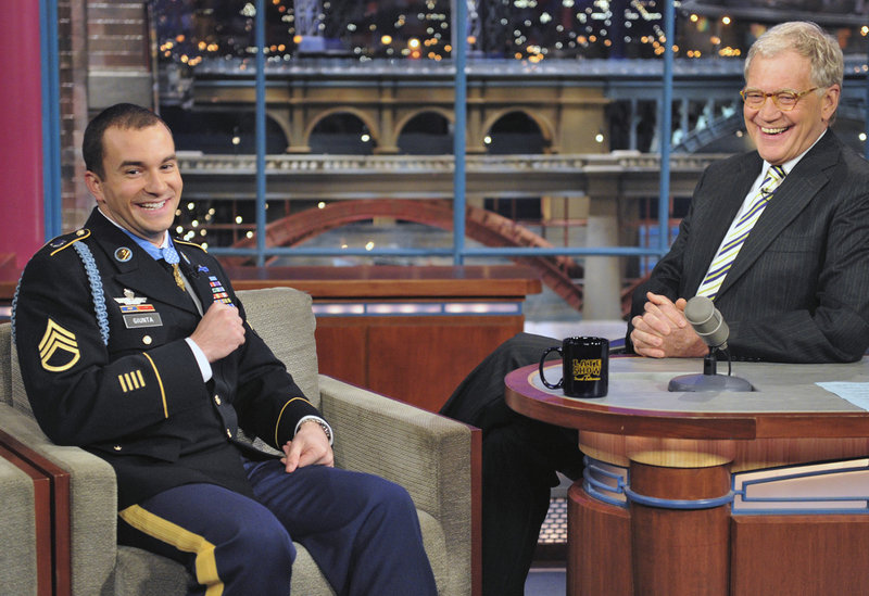 Medal of Honor recipient Army Staff Sgt. Sal Giunta joins David Letterman on the set of the “Late Show with David Letterman” in November. Speaking of his actions under fire in Afghanistan, Giunta says he only did what his comrades would have done for him.
