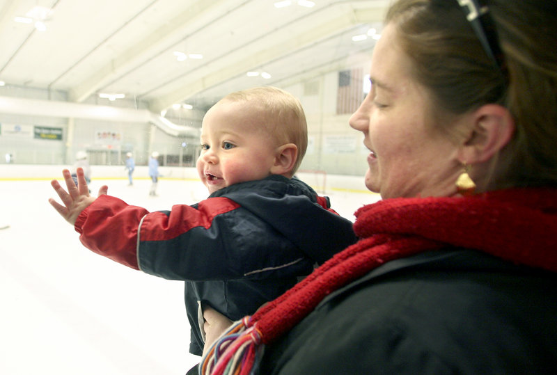 Ryan McGibbon of Buxton may be just 11 months old, but he’s about ready to jump onto the ice and skate with the other kids during the Black Bears’ clinic at Family Ice in Falmouth.