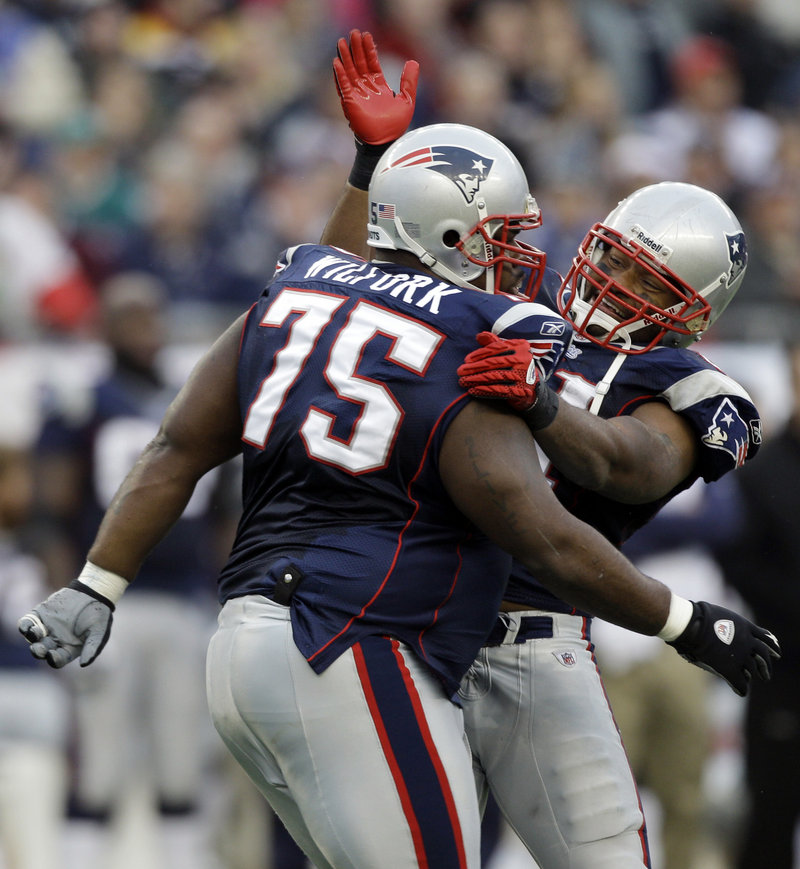 Patriots lineman Vince Wilfork, left, and linebacker Jerod Mayo lead a defense that has the attention of opposing coaches.