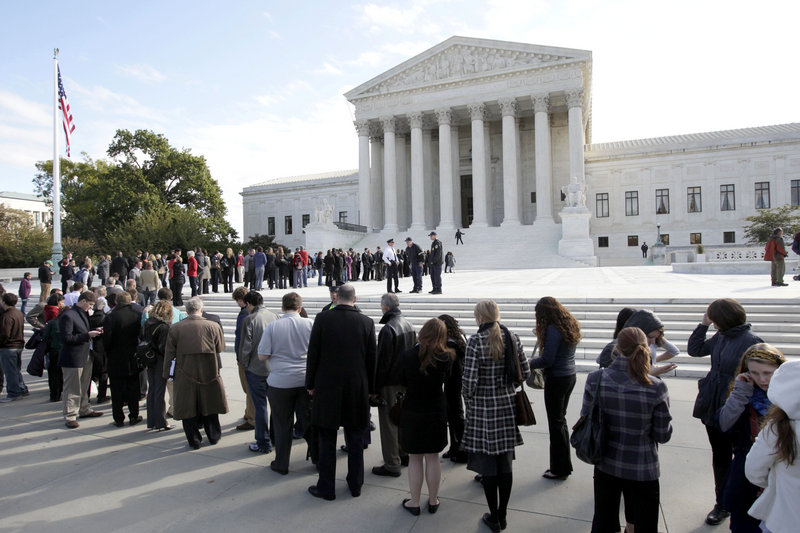 People wait in line in front of the Supreme Court in Washington – a capital city of magnificent front entrances that visitors no longer can enter. On Constitution Avenue, Pennsylvania Avenue and Capitol Hill, marble staircases, sculptures, gardens and ornate doors beckoned citizens in the past. Most of them now stand empty and sealed.