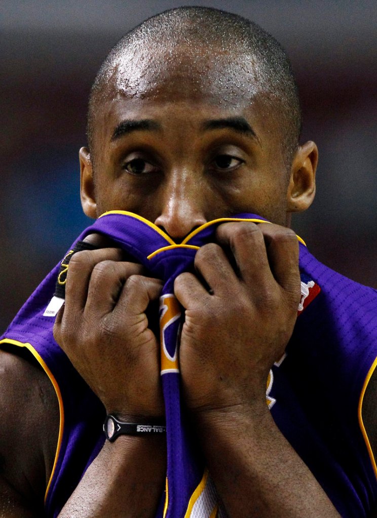 Los Angeles Lakers’ Kobe Bryant wears a Power Balance bracelet on his right wrist during an NBA basketball game.