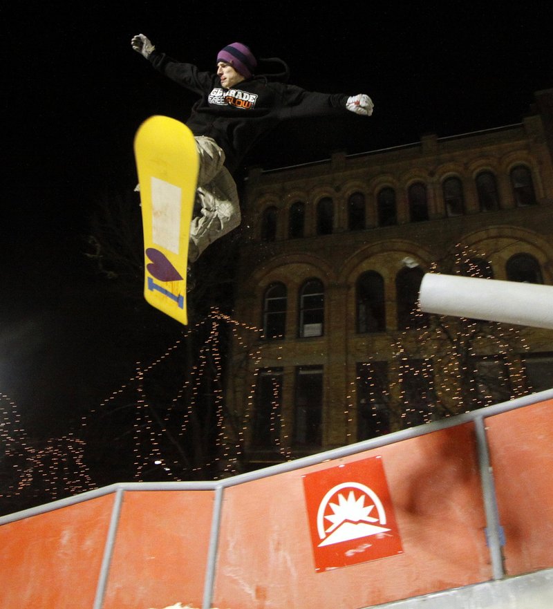 Will Mayo of Augusta launches off a pipe during the Downtown Showdown at Monument Square in Portland last January. This year’s ski and snowboard contest on man-made snow is set for Feb. 11.