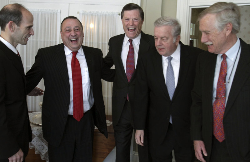 Paul LePage shares a laugh with four former Maine governors at the Blaine House before heading to his swearing-in ceremony Wednesday at the Augusta Civic Center. From left are John Baldacci, LePage, John McKernan, Joseph Brennan and Angus King.