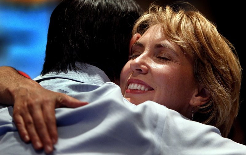 U.S. Rep. Gabrielle Giffords gets a hug from a supporter at the Pima County Democratic election party Nov. 2 in Tucson, Ariz. Giffords, 40, who was shot Saturday, has been mentioned as a possible Senate or gubernatorial candidate.