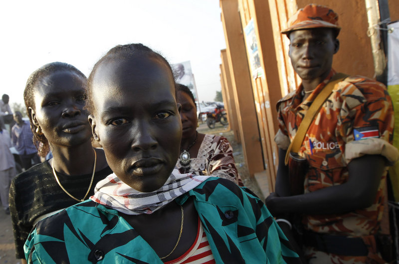 Southern Sudanese women line up to vote in Juba, Sudan, on Sunday. The referendum on independence is part of the peace deal that ended the 22-year civil war in the country.