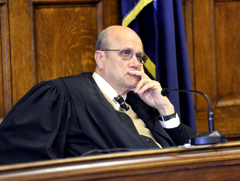 Judge Roland Cole listens to opening statements Monday in Cumberland County Superior Court.