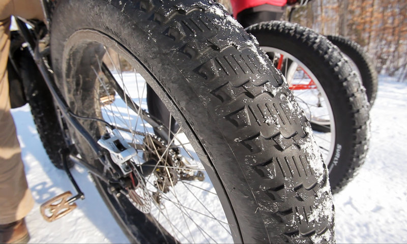 Tires on a winter bike are 4 inches wide, compared to the roughly 2-inch tires on traditional mountain bikes. The fat tire grips the snow and provides a more stable ride.