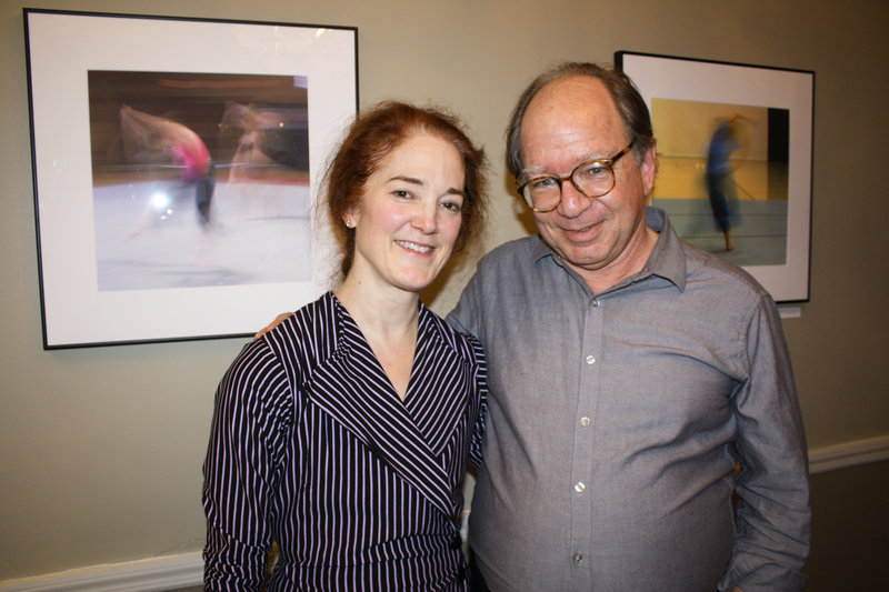 Dancer Karen Montanaro and photographer Arthur Fink stand in front of two of Fink’s images, on view at The Danforth in Portland through the end of the month. The show is open daily from 11 a.m. to 7 p.m.