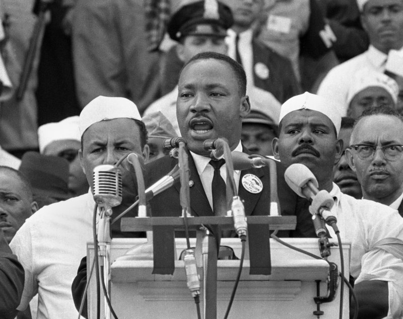 King, head of the Southern Christian Leadership Conference, addresses thousands of civil rights marchers during his famous "I Have a Dream" speech at the Lincoln Memorial in Washington, D.C.