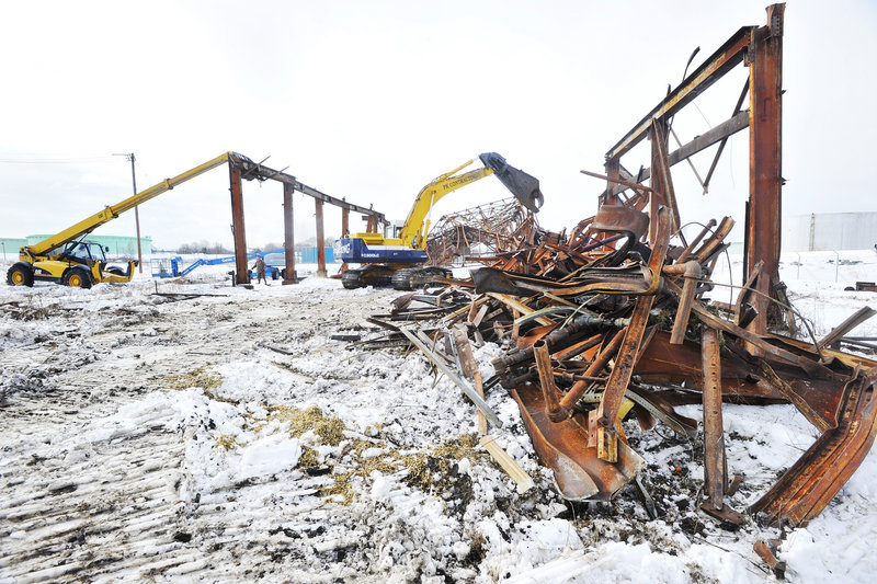 Demolition work at the former shipbuilding site in South Portland was expected to continue for a week.