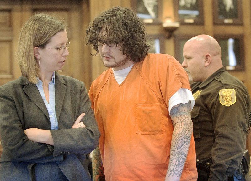 Chad Gurney consults with defense attorney Sarah Churchill at his murder trial Thursday in Superior Court. In closing arguments, Churchill said Gurney’s delusional thinking was apparent from the evidence in the case.