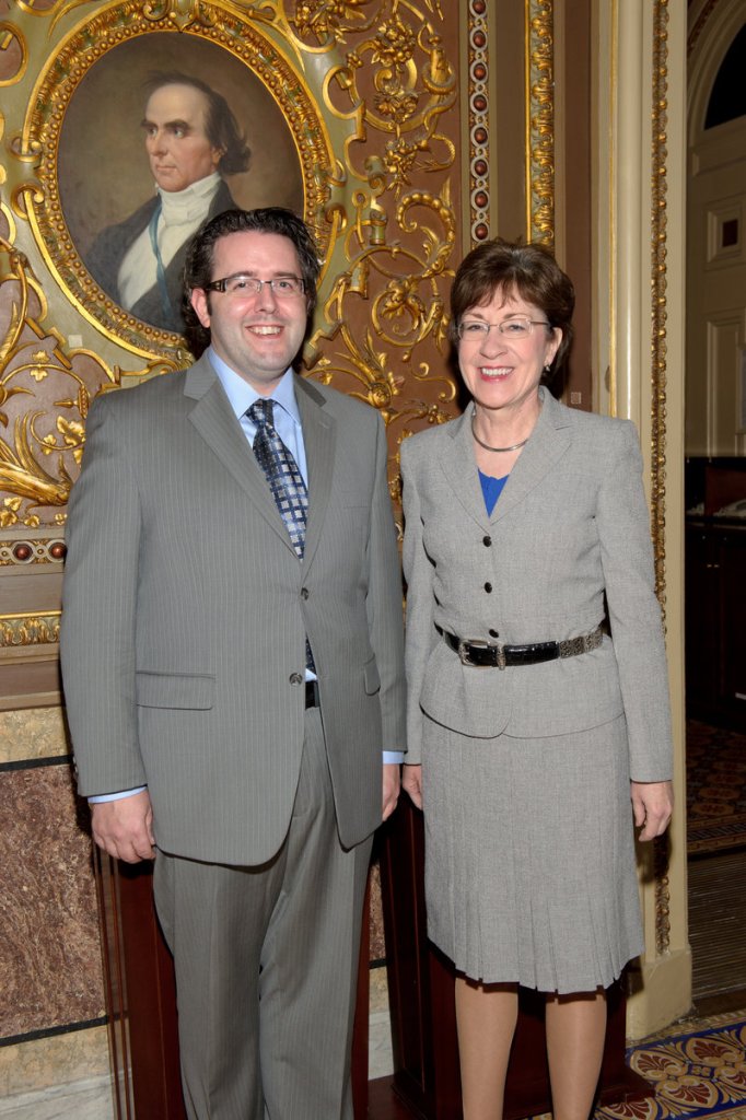 Shawn Towle, a Falmouth Middle School teacher who received a Presidential Award for Excellence in Mathematics and Science teaching, poses with Sen. Susan Collins.