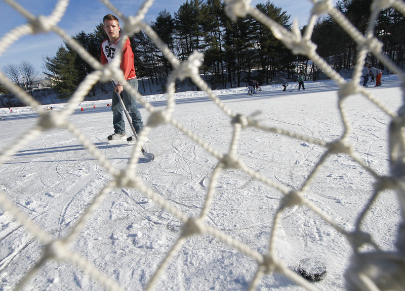 Justin Ouellette, 16, of Biddeford shoots a puck Saturday at West Brook Ice Rink on Pool Street in Biddeford. Efforts are under way to address a serious erosion problem.