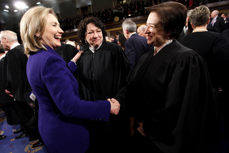 Secretary of State Hillary Rodham Clinton greets U.S. Supreme Court Justices Elana Kagan, right, and Sonia Sotomayor before President Obama’s State of the Union address, which all of the justices traditionally attend.