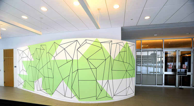 Mark Wethli’s mural “Locus” greets visitors to the Osher Map Library at the University of Southern Maine in Portland.