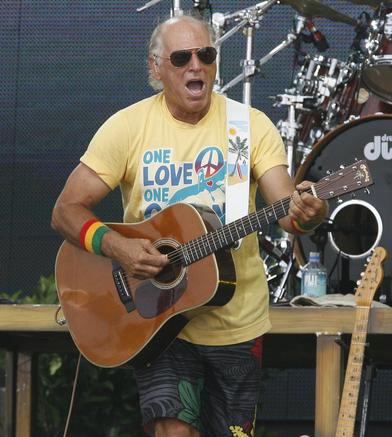 Jimmy Buffett performs in Gulf Shores, Ala., last July. Buffett fell off a stage at the end of a concert in Sydney, Australia.