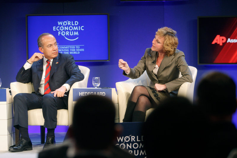 Mexico’s President Felipe Calderon, left, and European Commissioner for Climate Action Connie Hedegaard participate in a session on Climate Change at the World Economic Forum in Davos, Switzerland, on Thursday. Calderon said very little can be achieved without U.S. involvement, and he called for a change in American public opinion on global warming.