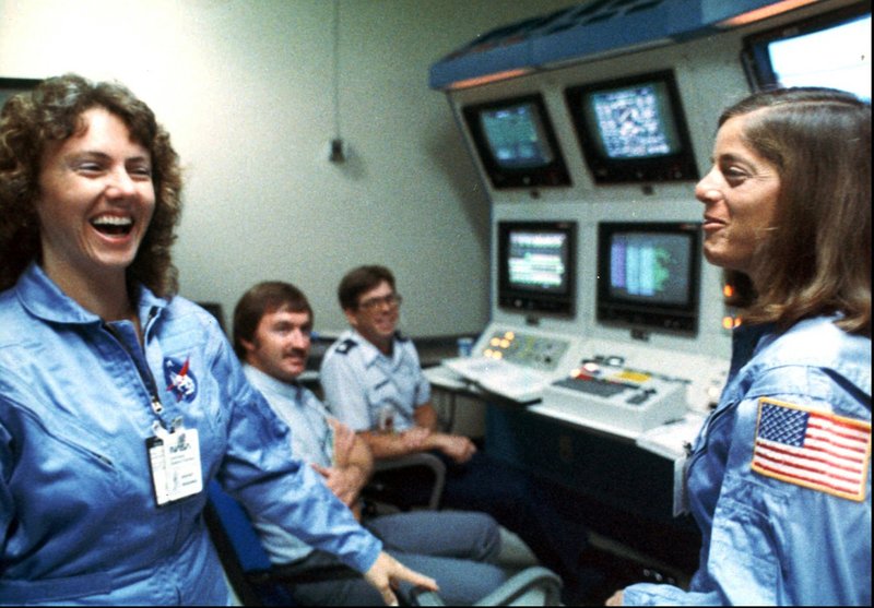 Christa McAuliffe, left, and Barbara Morgan, her backup, laugh during training in early 1986. “Imagine a history teacher making history,” McAuliffe said before the Challenger flight.