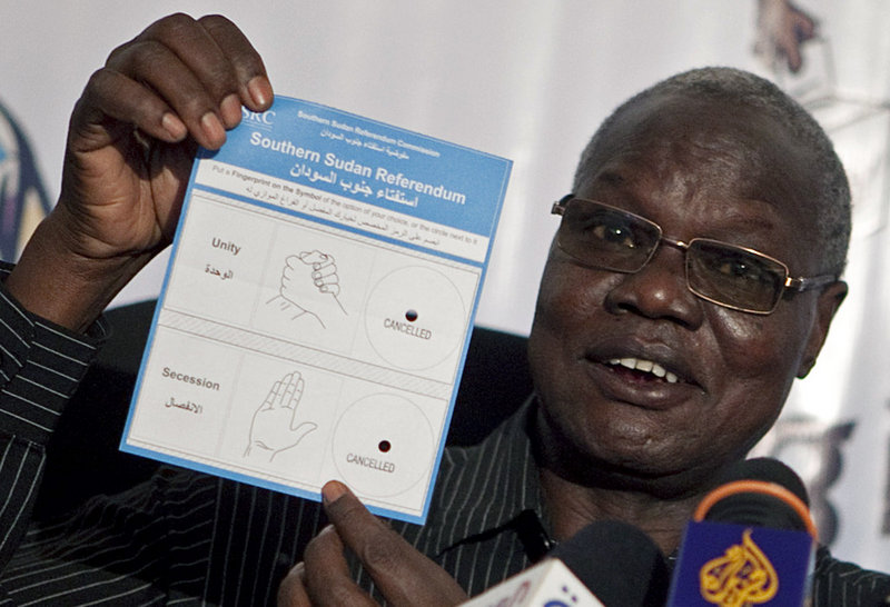 Justice Chan Reec Madut, chairman of the Southern Sudan Referendum Bureau, displays the referendum ballot during a news conference early this month in Juba, southern Sudan.