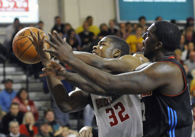 DeShawn Sims of the Red Claws goes for a rebound against the Springfield Armor today at the Portland Expo.