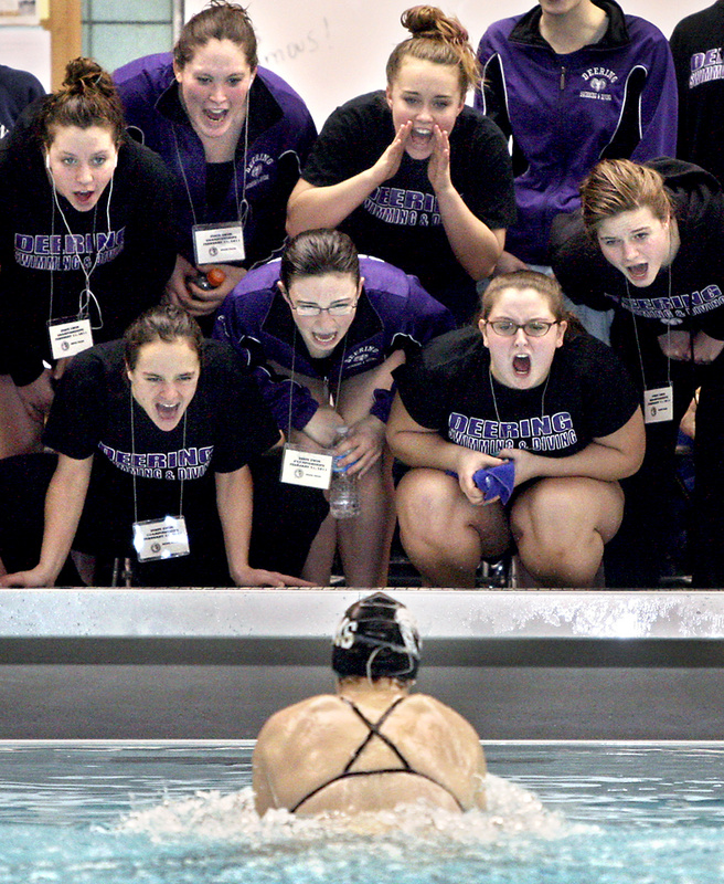 Genevieve Worthely, a sophomore at Deering High School, got plenty of encouragement from teammates during the 200-yard individual medley at the Class A state meet Monday at Bowdoin College. Worthely dropped an amazing eight seconds from her seed time to win the event. The Bangor girls won the team title while Greely High’s boys won in Class B in Orono. It was a big day for high school swimming, track and basketball.