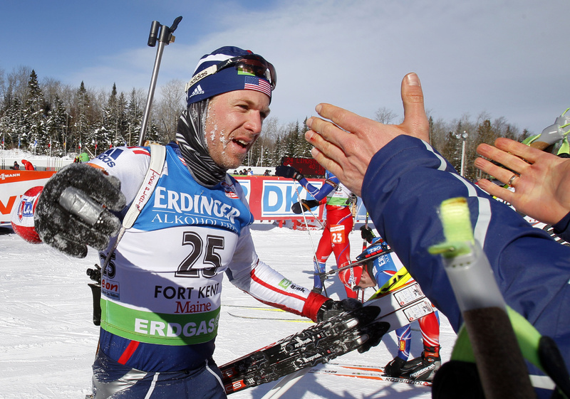 Lowell Bailey accepts congratulations after finishing in ninth place in the men's 15 kilometer mass start race at the Biathlon World Cup today.