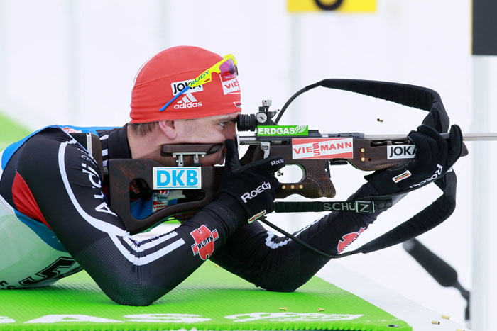 Arnd Peiffer, of Germany, shoots from the prone position on his way to winning the men's 10-kilometer sprint at the Biathlon World Cup today in Presque Isle.