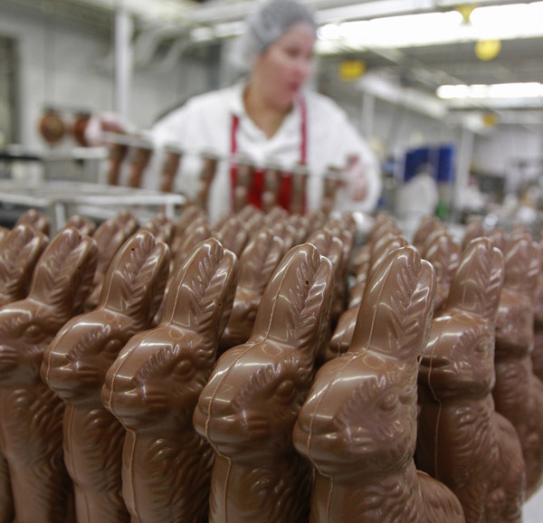 Freshly made chocolate bunnies at the Lake Champlain Chocolates factory in Burlington, Vt. Cocoa bean and sugar prices are going up, and industry observers say the Easter bunny may be dip a little deeper into your pocket this year.