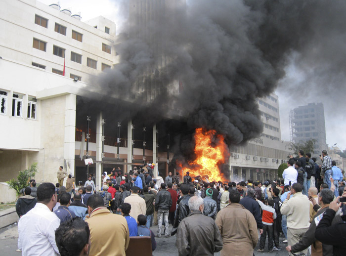 The local government headquarters is set on fire by protesters, claiming delays on requests for housing in Port Said today. Labor unrest across Egypt has given powerful momentum to the wave of anti-government protests.