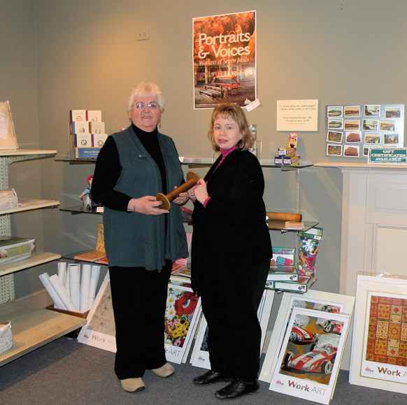 Museum L-A's gift shop. Susan Bean, the archivist and public relations coordinator for the museum, is on the right.