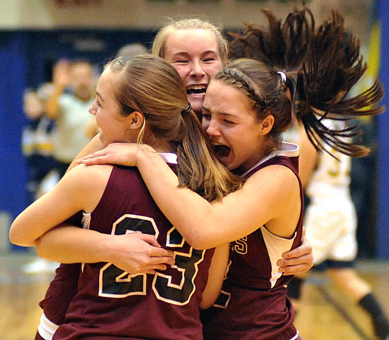 It's celebration time for the Nokomis girls after they successfully defended their Eastern Class B title.