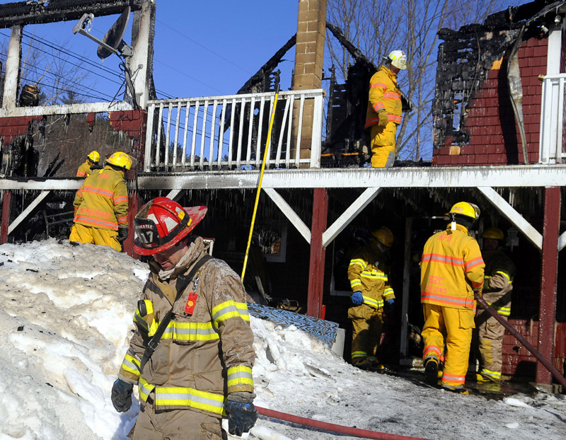 ON SCENE: Firefighters extinguish a fatal blaze early Wednesday that destroyed a home at 447 Church Road, Readfield.
