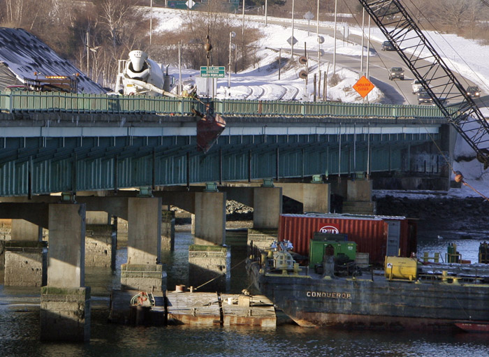 Crews work on a foundation for a pier of the new bridge today.