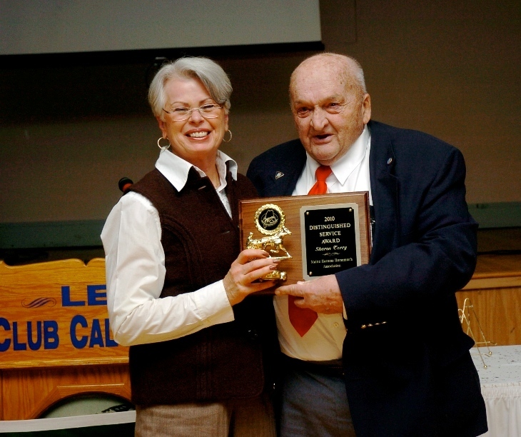 Sharon Terry, president and owner of Scarborough Downs, received the Sheridan Smith Distinguished Service Award at the Maine Harness Horsemen’s Association annual banquet held Jan. 22 at The Calumet Club in Augusta. Smith presented the award.