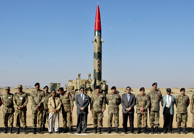 Civilian and military officials from Pakistan stand in front of a short-range Ghazanvi missile prior to a successful test firing in 2008. The missile, which has a range of 180 miles, is capable of carrying a nuclear device.