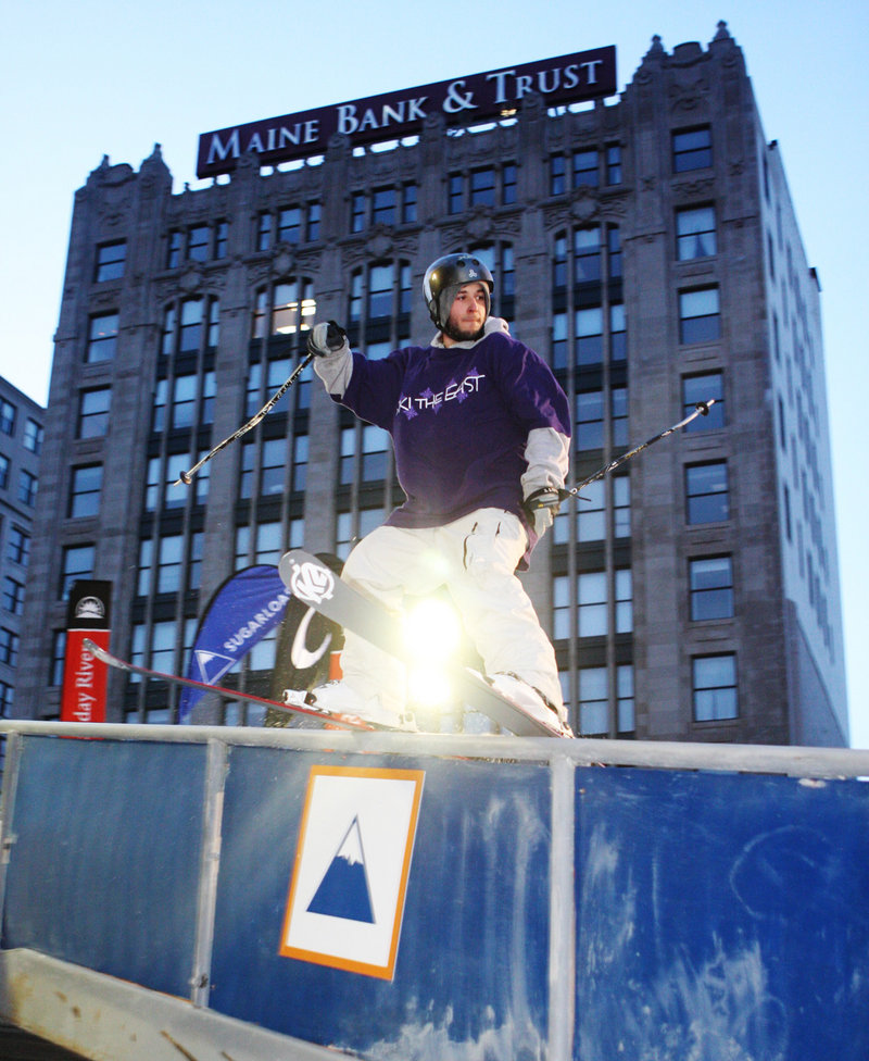 A skier competes in a previous Downtown Showdown in Portland’s Monument Square. This year’s event, starting at 5 p.m. Friday, will feature snowboarders and skiers performing tricks on rails and other constructed features.