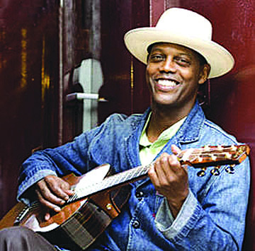 Eric Bibb, top, and Harry Manx, below, perform together in Brownfield on Friday.