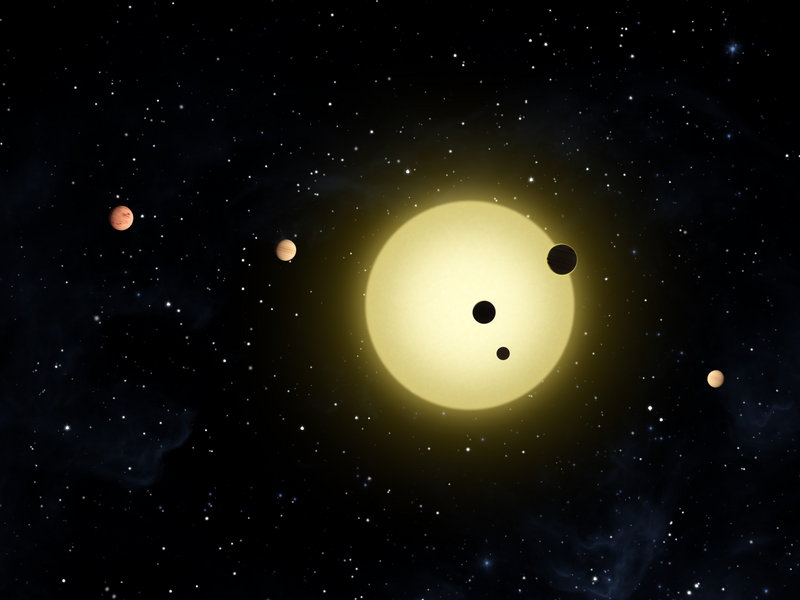 An artist’s rendering provided by NASA shows Kepler-11, a sun-like star around which six planets orbit. The planet-hunting Kepler telescope has found 1,235 possible planets during its first year in orbit – 54 of which appear to be in possibly life-friendly zones.
