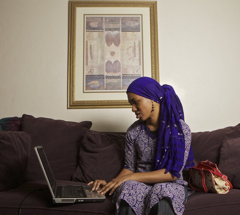 Producer-writer Khadijah Rashid works on a script at her home in Pasadena, Calif.